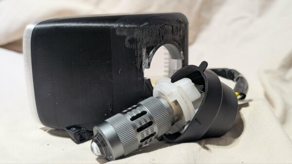 2026/07/1000018577-scaled.jpg Honda NU50 Headlight With BA20D Bulb